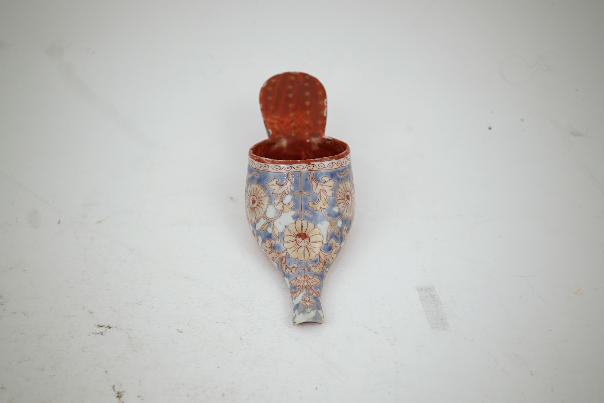 A rare Japanese Arita or Chinese porcelain model of a shoe, based on a Delft shape, first half of 18th century